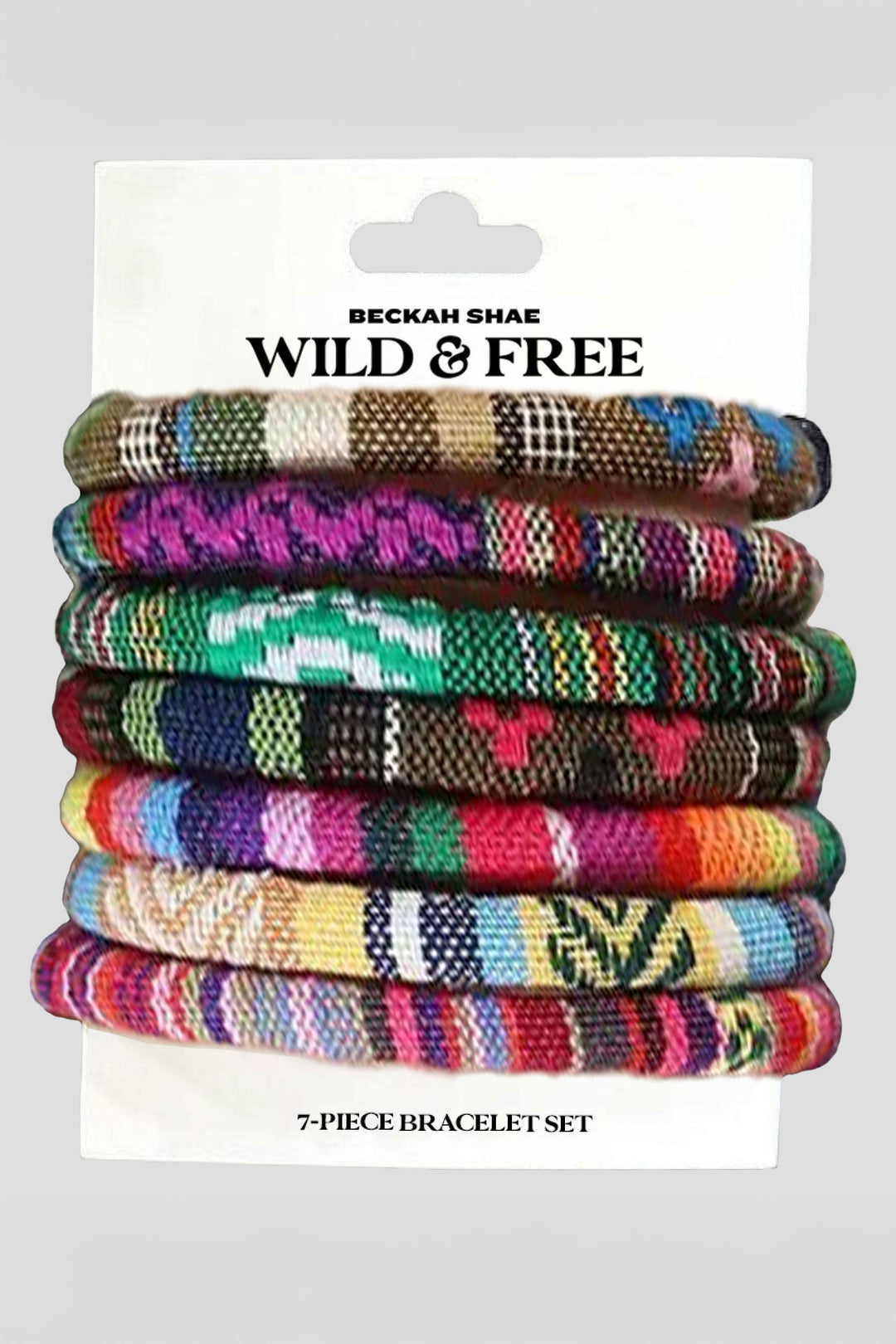 Colorful 7-piece Wild & Free bracelet set by Beckah Shae featuring woven boho designs inspired by African patterns, displayed on branded card with carry case included.