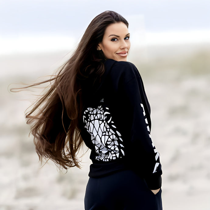 The ‘Awake Lion Hoodie’ features a lion face graphic design on the back with the text 