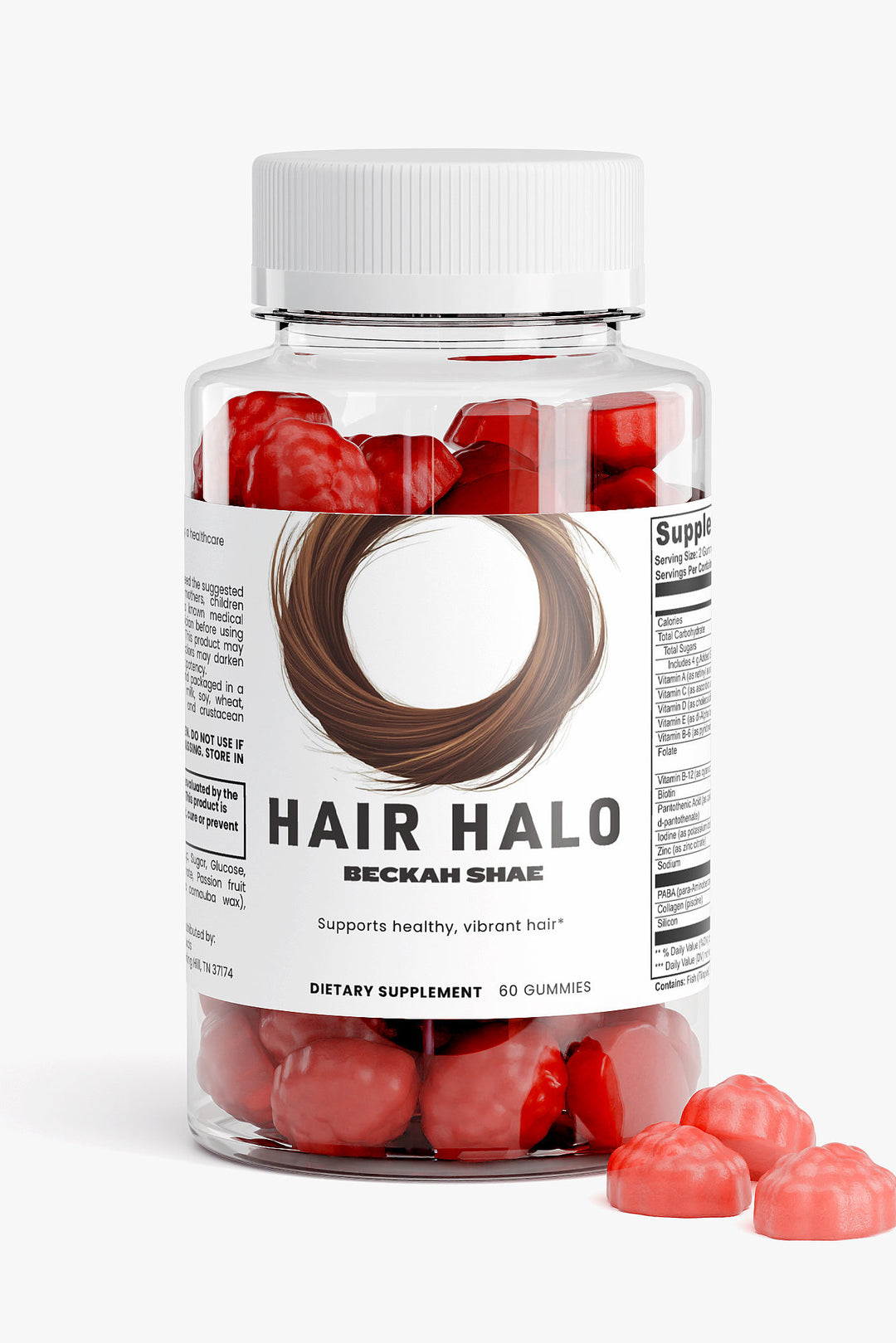 Hair Halo supplement bottle lying on its side with vibrant red gummies spilling out, highlighting gummy shape and texture.