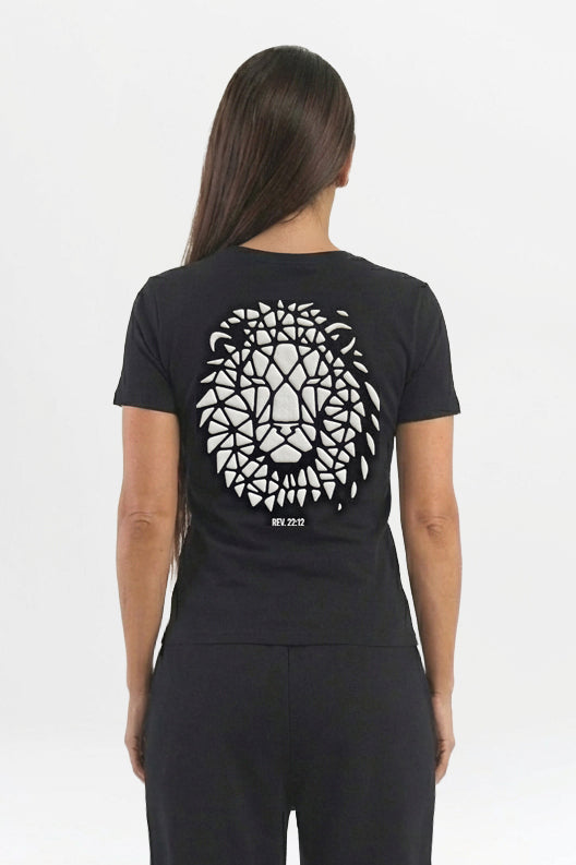 Person wearing a black t-shirt with a white geometric design on the back against a white background with the scripture Revelation 22:12 underneath.
